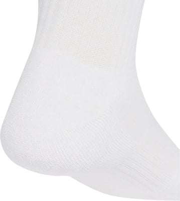 Detail einer weißen Socke mit feinem Rippstrick und verstärkter Ferse.