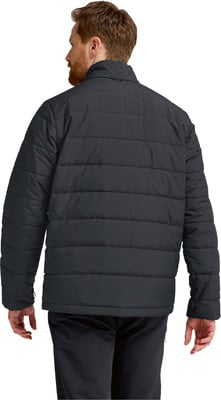 Mann von hinten in dunkler Steppjacke und Hose. Mann von hinten in dunkler Steppjacke und Hose.