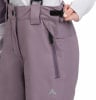 Detail einer Skihose mit Reißverschlusstasche und verstellbarem Klettverschluss.