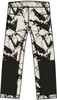 Hose mit beigem Untergrund und schwarzem abstraktem Muster.