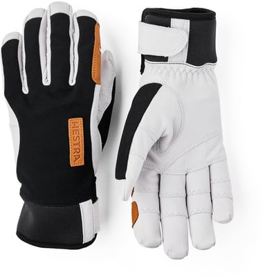 Hestra Skihandschuhe in Schwarz und Weiß mit Lederdetails. Hestra Skihandschuhe in Schwarz und Weiß mit Lederdetails.