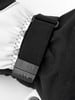 Detail eines Hestra-Skihandschuhs mit verstellbarem Riemen.