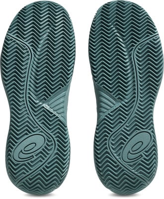 Schuhsohle eines Tennisschuhs mit charakteristischem Muster und Asics-Logo. Schuhsohle eines Tennisschuhs mit charakteristischem Muster und Asics-Logo.