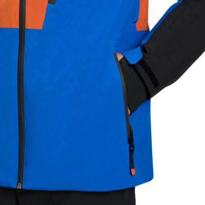 Blaue Jacke mit orangefarbenen und schwarzen Einsätzen und Reißverschlusstasche. Blaue Jacke mit orangefarbenen und schwarzen Einsätzen und Reißverschlusstasche.