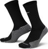 Schwarze Nike-Socken mit weißem Logo und gestreifter Sohle.