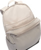 Detail des Innenraums eines beigen Rucksacks mit Taschen und einer seitlichen Netztasche.