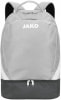 Grauer Jako Rucksack mit weißem Logo und dunklem Boden.