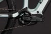 Detailaufnahme der Kurbel und Kette eines E-Bikes mit ACID-Logo.
