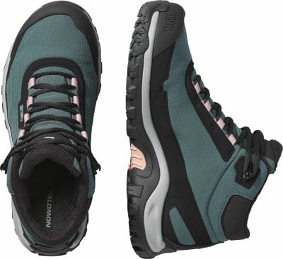 Damen-Wanderschuhe von Salomon in Dunkelgrün mit rosa Akzenten. Damen-Wanderschuhe von Salomon in Dunkelgrün mit rosa Akzenten.