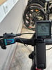 Das Bosch E-Bike Display zeigt 100% Ladung und 1170 km Reichweite an.