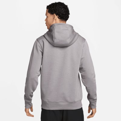 Rückansicht eines Mannes in einem grauen Kapuzenpullover und schwarzer Hose. Rückansicht eines Mannes in einem grauen Kapuzenpullover und schwarzer Hose.