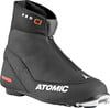Schwarzer Atomic Pro CI Langlaufschuh mit orangefarbenem Logo und Frontreißverschluss.