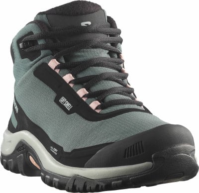 Ein graugrüner Damen-Wanderschuh von Salomon mit schwarzen Schnürsenkeln und rosa Akzenten. Ein graugrüner Damen-Wanderschuh von Salomon mit schwarzen Schnürsenkeln und rosa Akzenten.