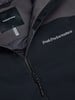 Detail einer Peak Performance Jacke mit Logo und Reißverschluss.