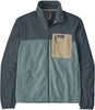 Eine zweifarbige Patagonia Fleecejacke in Grau und Blau mit einer beigen Brusttasche.