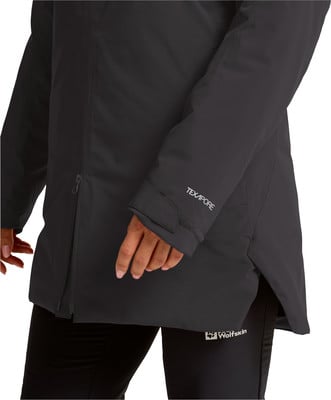 Jackendetail mit TEXAPORE-Schriftzug und Wolfskin-Logo auf Leggings. Jackendetail mit TEXAPORE-Schriftzug und Wolfskin-Logo auf Leggings.