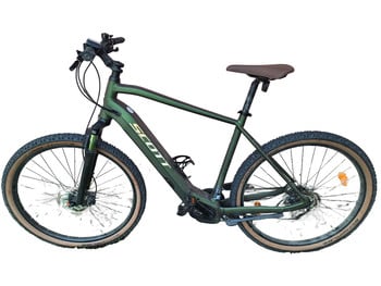 Grünes Scott E-Bike mit braunem Sattel und schwarzen Felgen.