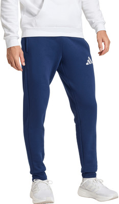 Blaue Jogginghose mit weißem Adidas-Logo und weißen Turnschuhen. Blaue Jogginghose mit weißem Adidas-Logo und weißen Turnschuhen.