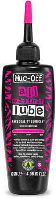 Schwarze Flasche mit rosa Verschluss und Aufschrift Muc-Off All Weather Lube.