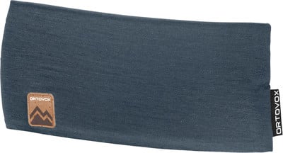 Blaues Stirnband mit ORTOVOX-Logo und Bergen. Blaues Stirnband mit ORTOVOX-Logo und Bergen.