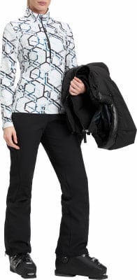 Frau in Skibekleidung mit Jacke in der Hand. Frau in Skibekleidung mit Jacke in der Hand.