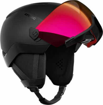 Schwarzer Atomic Skihelm mit pink-orangem Visier. Schwarzer Atomic Skihelm mit pink-orangem Visier.