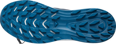 Blaue Laufschuhsohle mit ausgeprägtem Profil für bessere Traktion. Blaue Laufschuhsohle mit ausgeprägtem Profil für bessere Traktion.
