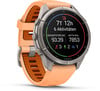 Eine Garmin-Uhr mit orangefarbenem Armband und einem Aktivitätsdisplay.