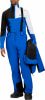 Mann in blauer Skihose und Jacke mit schwarzen und weißen Akzenten.