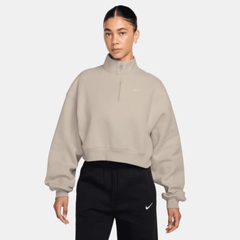 Damen-Sweatshirt von Nike in Beige mit kurzem Reißverschluss.