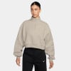 Damen-Sweatshirt von Nike in Beige mit kurzem Reißverschluss.
