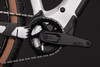 Detail eines E-Bikes mit Kette und ACID-Kurbeln.