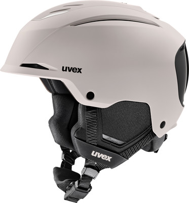 Ein beiger Skihelm von Uvex mit integriertem Visier und einstellbarer Belüftung. Ein beiger Skihelm von Uvex mit integriertem Visier und einstellbarer Belüftung.