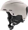Ein beiger Skihelm von Uvex mit integriertem Visier und einstellbarer Belüftung.