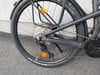 Hinterrad mit Schaltwerk, Kassette und Schutzblech am Fahrrad.