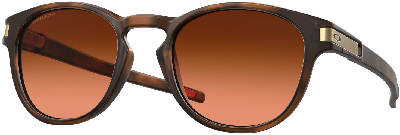 Braune runde Sonnenbrille mit orangefarbenen Gläsern und Schildpatt-Rahmen.
