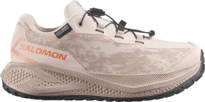 Beige Salomon Laufschuh mit Schnellverschluss und wasserdichter Membran. Beige Salomon Laufschuh mit Schnellverschluss und wasserdichter Membran.