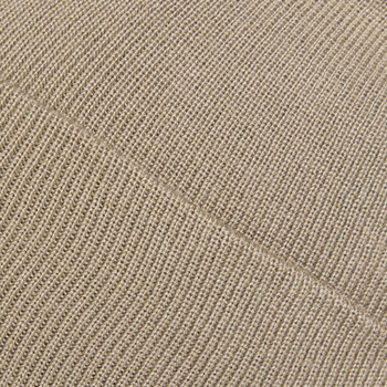 Detail eines beigen Strickstoffes mit feinem Muster