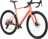 Ein pinkes Gravelbike mit schwarzen Rädern und Lenker.