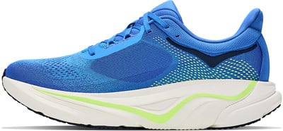 Blauer Laufschuh mit weißer Sohle und grünen Akzenten. Blauer Laufschuh mit weißer Sohle und grünen Akzenten.