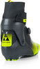 Fischer Skischuh in Schwarz und Neongelb mit BOA-Verschluss.