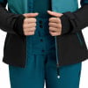 Detail einer Damen-Winterjacke mit schwarzen und türkisfarbenen Einsätzen und Reißverschluss.