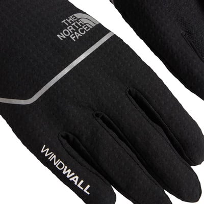 Schwarze Handschuhe von The North Face mit reflektierenden Elementen und Windwall-Aufschrift. Schwarze Handschuhe von The North Face mit reflektierenden Elementen und Windwall-Aufschrift.