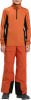 Junge in einem orangefarbenen Skianzug mit schwarzen Akzenten.