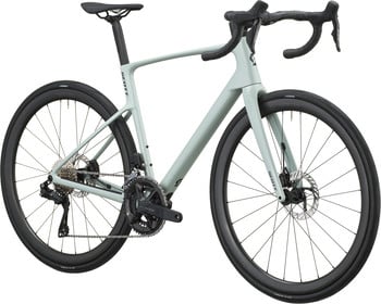 Ein hellgrünes Scott Rennrad mit Scheibenbremsen und schwarzen Laufrädern.