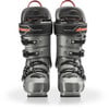 Zwei graue Nordica Skischuhe mit roten Details und Schnallen.