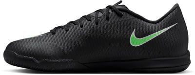 Schwarze Herren-Hallenfußballschuhe von Nike mit limettengrünem Logo. Schwarze Herren-Hallenfußballschuhe von Nike mit limettengrünem Logo.