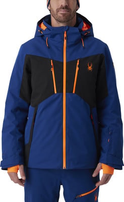 Blaue Skijacke mit schwarzen und orangefarbenen Details, Spyder-Logo. Blaue Skijacke mit schwarzen und orangefarbenen Details, Spyder-Logo.