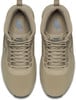 Draufsicht auf beige Nike-Sneaker mit Schnürung und Logos.