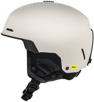 Ein beiger Skihelm mit schwarzen Details und Mips-Logo.